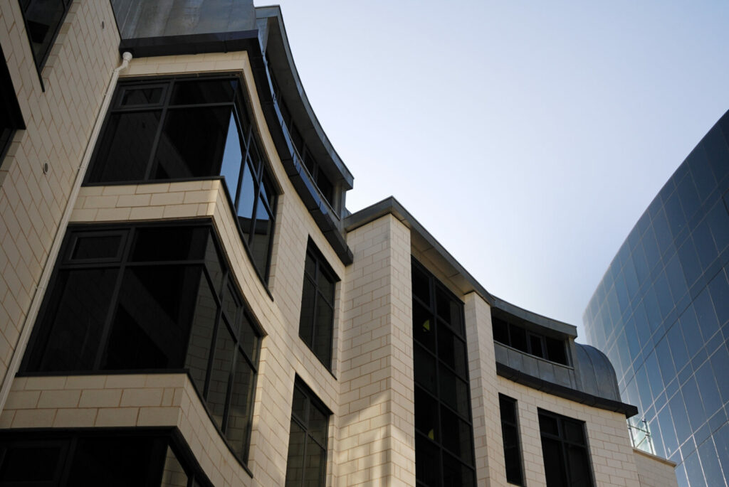 Brick-building-with-dark-tinted-windows